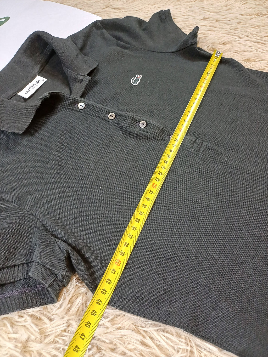 Polo noir Lacoste femme – taille 38 Lacoste