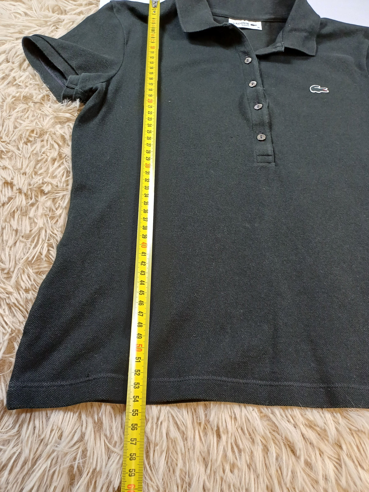 Polo noir Lacoste femme – taille 38 Lacoste