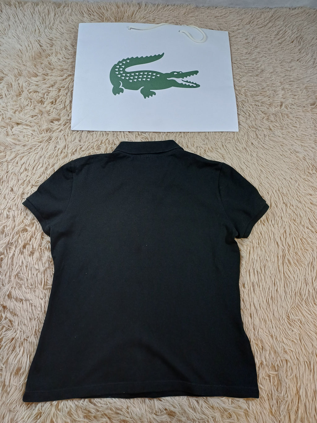 Polo noir Lacoste femme – taille 38 Lacoste