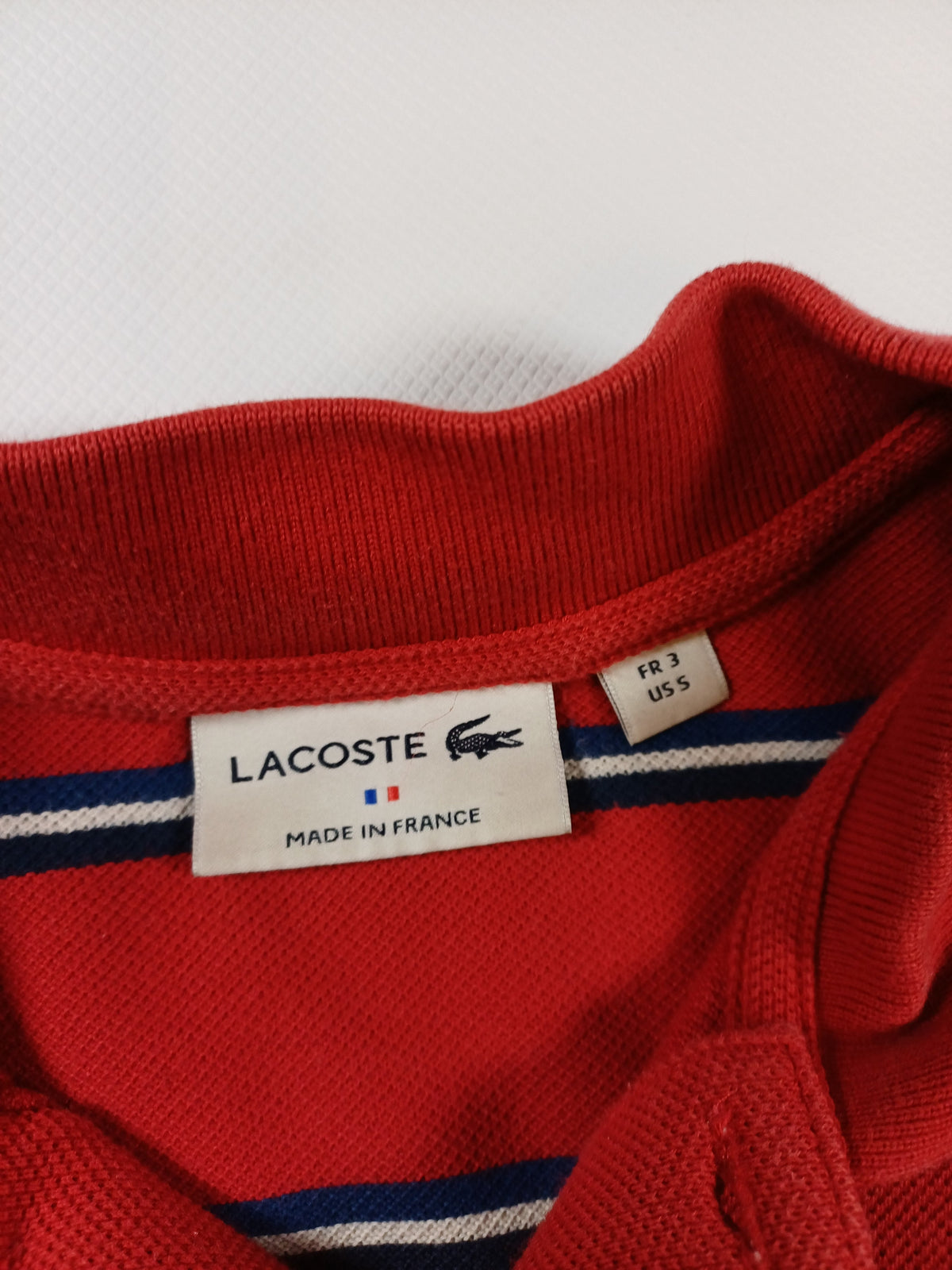 Polo rouge rayé Lacoste – taille 3 (S) Lacoste